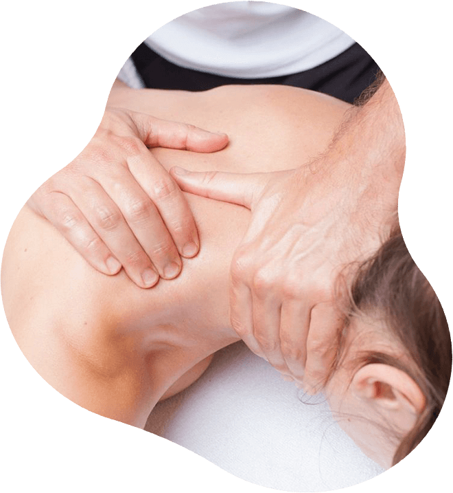 Physical Therapist Massaging Shoulder Region